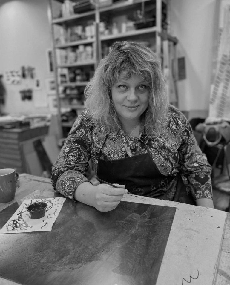 Sari Bremer Sari Bremer is a Helsinki-based graphic artist whose work maintains the tradition of metal etching, enabling a wide and at the same time completely unique pictorial expression. Her goal is for the viewer to experience an experience when looking at her work that offers both an escape from reality and forces once to confront it. She graduated from the Academy of Fine Arts in 2001 “In my pictures, I draw the borderlands between the familiar and the unknown, magical realism. In the themes of my images I weave together the beauty of nature and the dangers lurking there. In my pictures, I also deal with our ancestors, who have turned into mythical figures, and appear as reflections or flashes in the corner of the eye. Deep in the forest is a spring that mirrors space, reflecting our place in the cosmos. My themes mix easily and consciously with each other, and the pictures are a continuum of my previous works. I try to show the diversity of this technique and that good technical skill is important in the final result of the image. I make my works using the multi-colour metal graphics method, where the image is etched on 2-3 copper plates, from which it is printed on paper. The final work is created when several copper plates are printed on top of one paper. I do all my metal graphics prints myself, as this is an important part of the creation process, so there is a little variation in each print. The prints are numbered and T.PLá marked. I mark my prints with a running number and the size of the series is not limited, I also mark the date when I made the prints in question.”